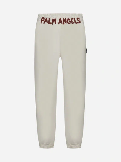 Shop Palm Angels Logo Cotton Sweatpants In Off White,red