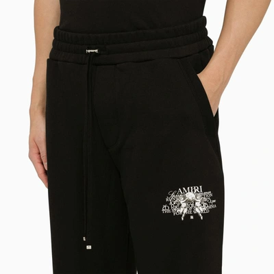 Shop Amiri Logoed Jogging Trousers In Black