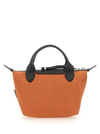 Shop Longchamp Le Pliage Energy Mini Bag In Orange