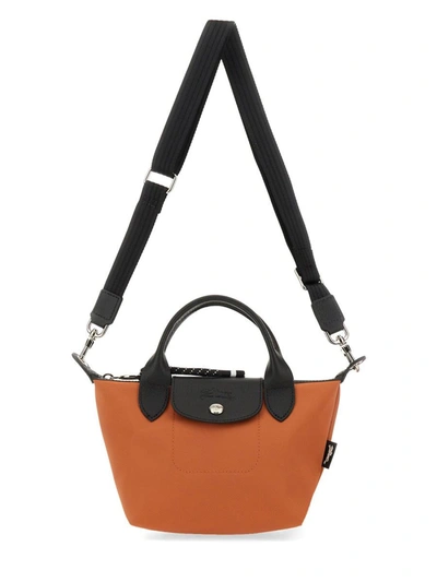 Shop Longchamp Le Pliage Energy Mini Bag In Orange
