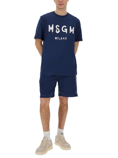 Shop Msgm Bermuda Shorts With Embroidered Logo In Blue