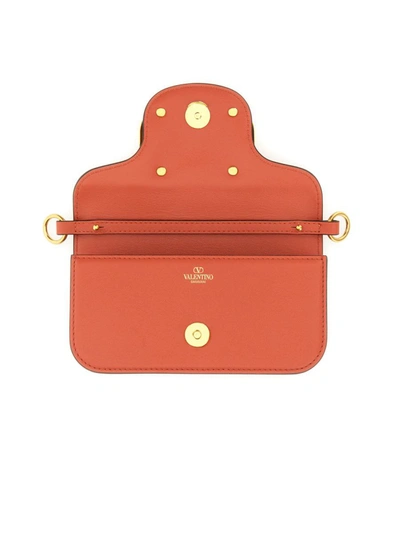 Shop Valentino Garavani Shoulder Bag "locò" Small In Orange