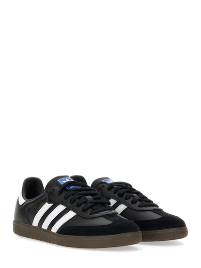 Shop Adidas Originals Samba Sneaker. In Black