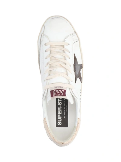 Shop Golden Goose Sneakers In White