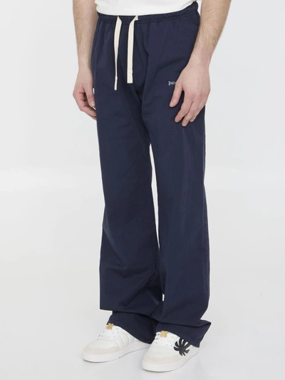 Shop Palm Angels Logo Pants In Blue