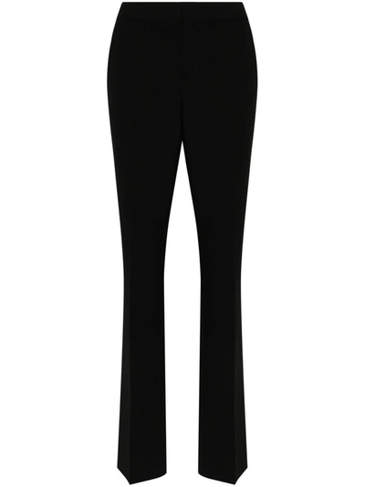 Shop Moschino Trousers With Detail In Black
