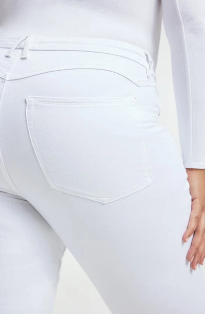 Shop Good American Good Classic High Waist Bootcut Jeans In White001