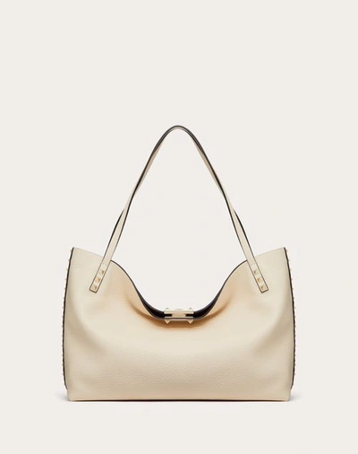 Shop Valentino Garavani Medium Rockstud Grainy Calfskin Bag With Contrasting Lining Woman Light Ivory/rub In Light Ivory/ruby