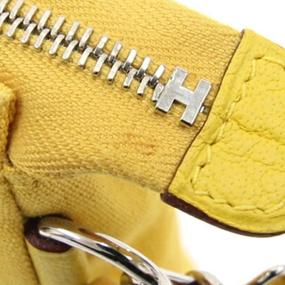 Shop Hermes Hermès Yellow Cotton Clutch Bag ()