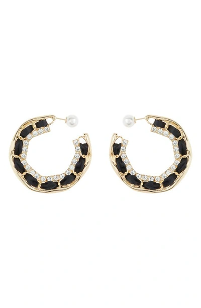 Shop Tasha Crystal Ribbon Hoop Earrings In Gold/ Black