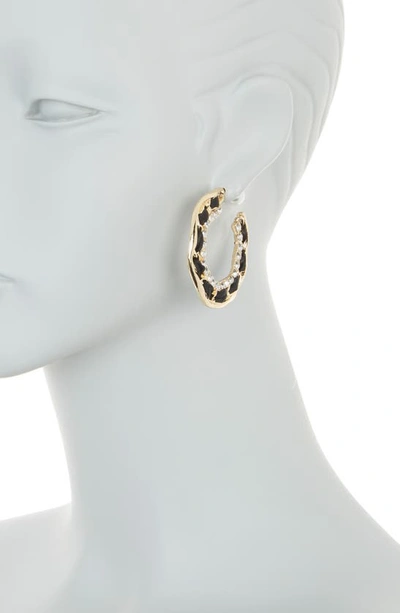 Shop Tasha Crystal Ribbon Hoop Earrings In Gold/ Black