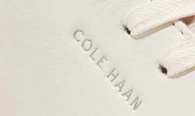 Shop Cole Haan Grandpro Crosscourt Traveler Sneaker In Ivory/ Blac
