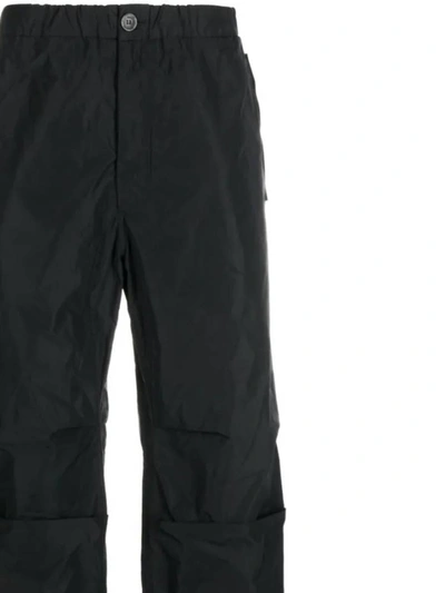 Shop Ferragamo Trousers In Black