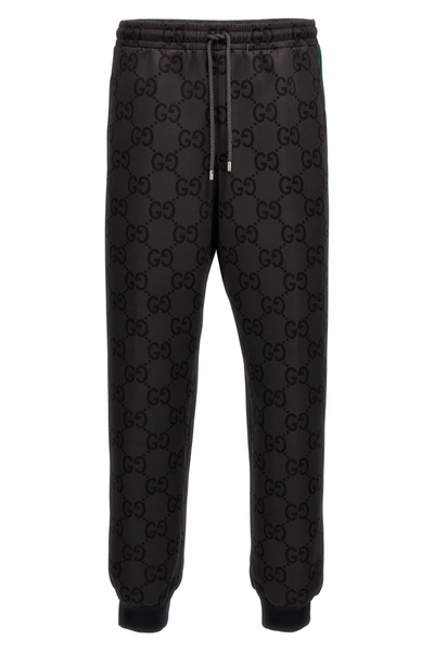 Shop Gucci Men 'jumbo Gg' Joggers In Gray