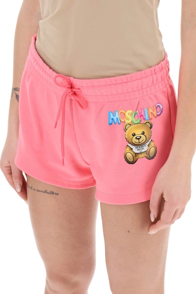 Shop Moschino Logo Printed Shorts Women In Pink