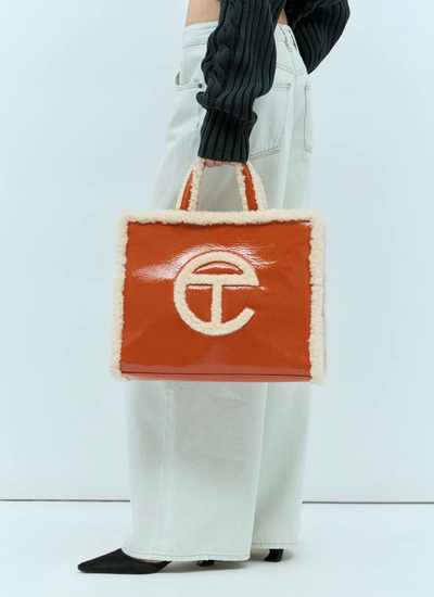 Shop Ugg X Telfar Women Medium Crinkle Tote Bag In Orange
