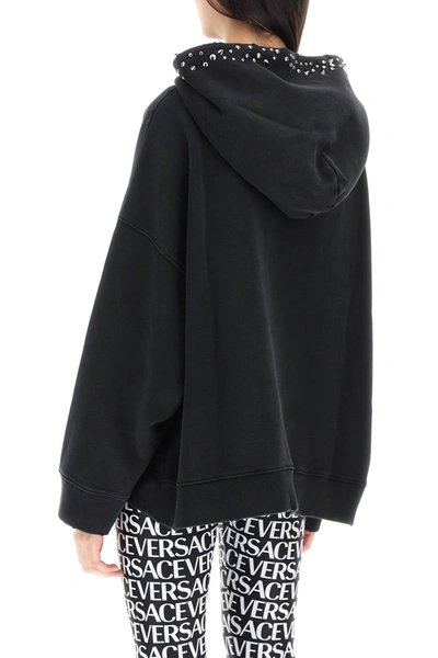 Shop Versace Hoodie With Studs Women In Black