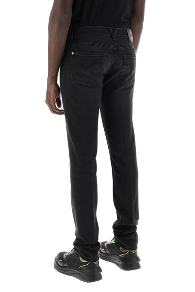 Shop Versace Slim Medusa Biggie Jeans Men In Black