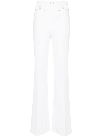 Shop Elisabetta Franchi Trousers In White