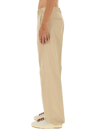 Shop Lanvin Twisted Chino Pants In Beige