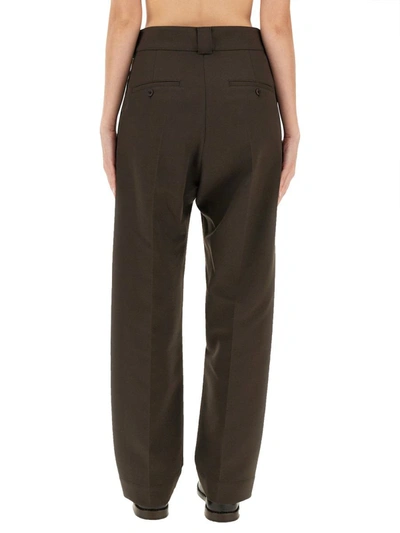 Shop Lemaire Carrot Fit Pants In Brown