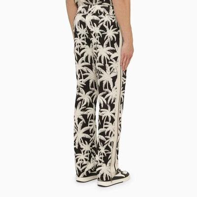 Shop Palm Angels Palm Print Jogging Trousers In Black