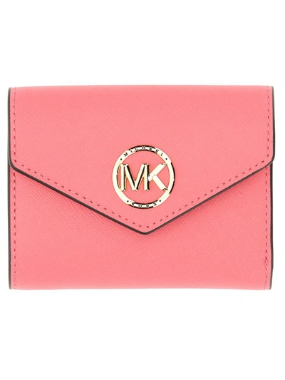 Shop Michael Michael Kors Michael Kors Greenwich Trifold Wallet In Pink