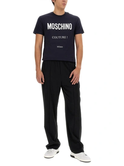 Shop Moschino T-shirt With Logo In Blue