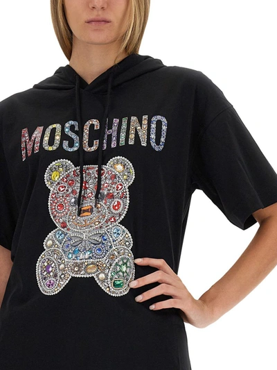 Shop Moschino Teddy Logo Dress In Black