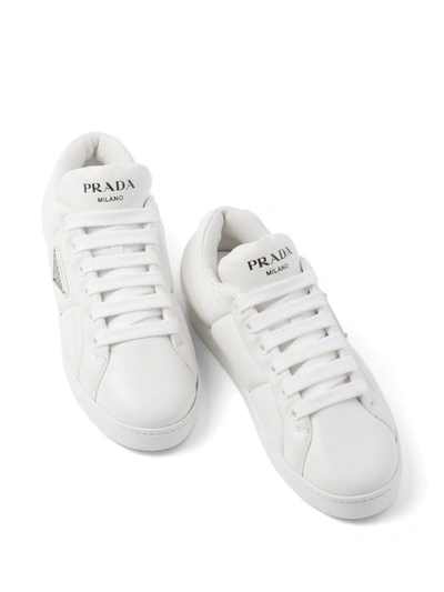 Shop Prada Triangle-logo Padded Sneakers In Bianco