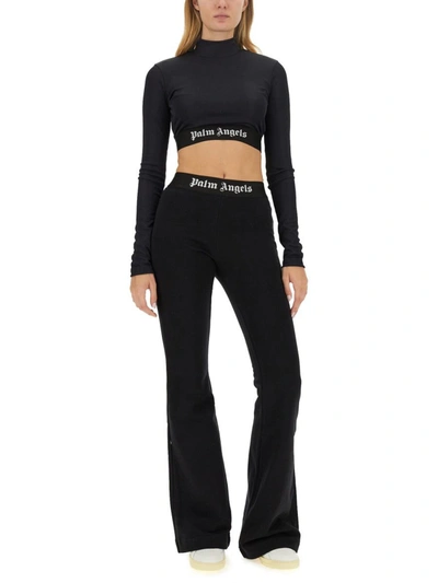 Shop Palm Angels Flare Fit Pants In Black