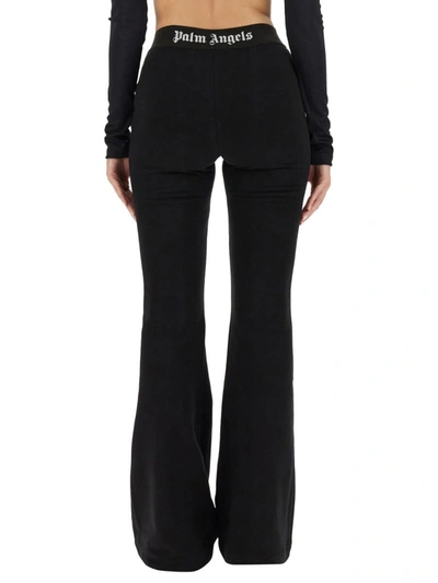 Shop Palm Angels Flare Fit Pants In Black