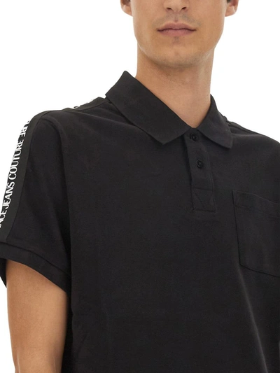 Shop Versace Jeans Couture Regular Fit Polo Shirt In Black