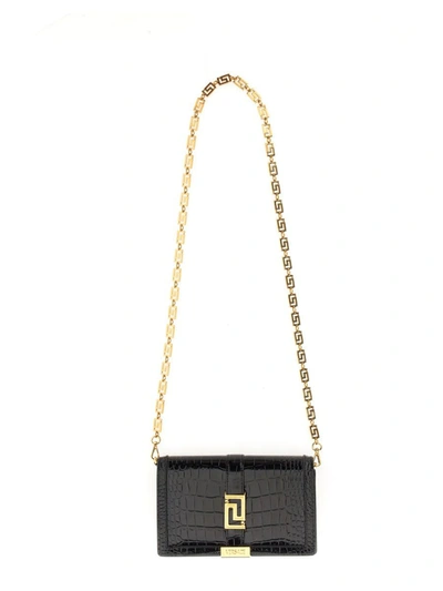 Shop Versace Mini Greca Goddess Bag In Black