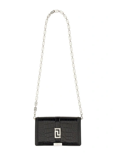 Shop Versace Mini Greca Goddess Bag In Black