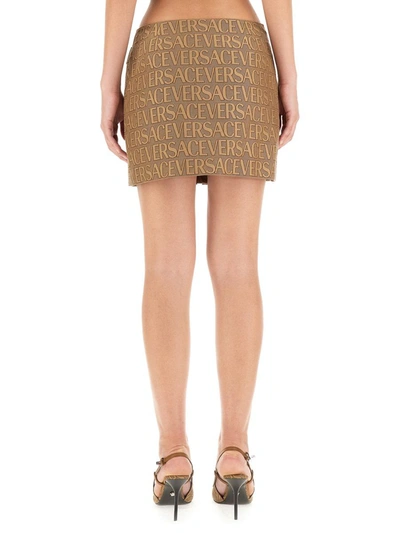 Shop Versace Mini Skirt In Brown