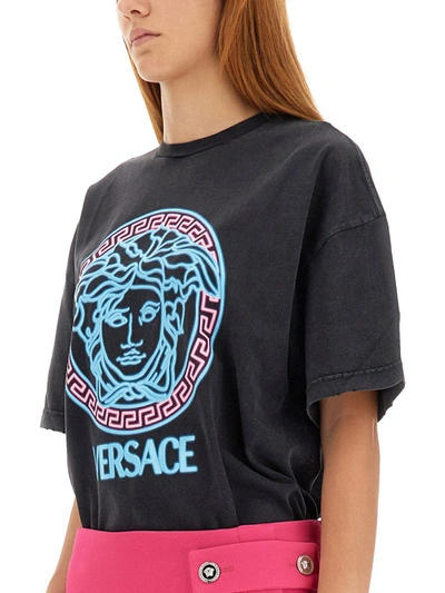 Shop Versace T-shirt With Worn Look In Black