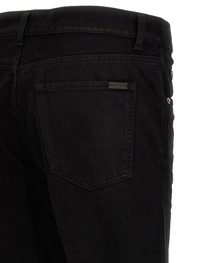Shop Saint Laurent Crinkled Effect Jeans Black