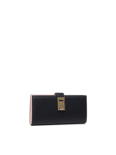 Shop Ferragamo Hug Continental Wallet In Leather In Black