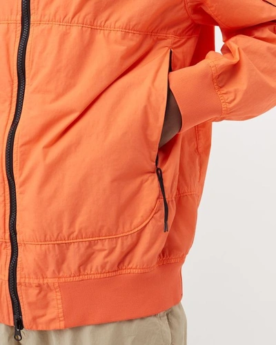 Shop Stone Island Compass Badge Lightweight Orange Hooded Jacket