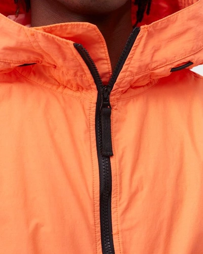 Shop Stone Island Compass Badge Lightweight Orange Hooded Jacket