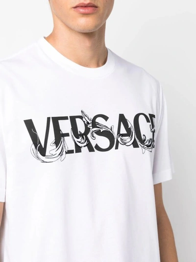 Shop Versace Logo-print Short-sleeved T-shirt In White