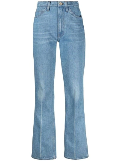 Shop Frame Flared Denim Denim Jeans In Blue