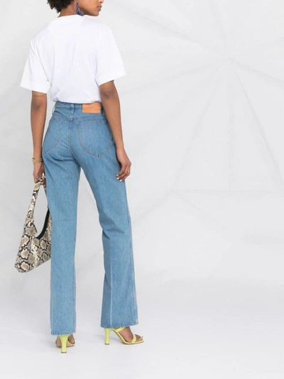 Shop Frame Flared Denim Denim Jeans In Blue