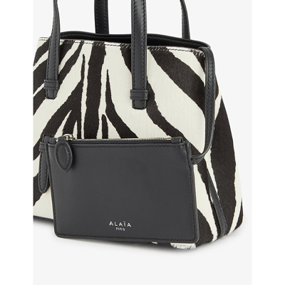 Shop Alaïa Mina 20 Zebra-pattern Top-handle Bag In Blanc/noir