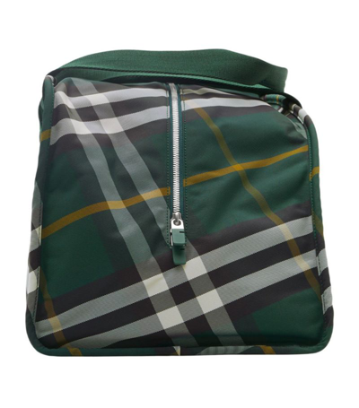 Shop Burberry Medium Shield Duffle Bag In Green