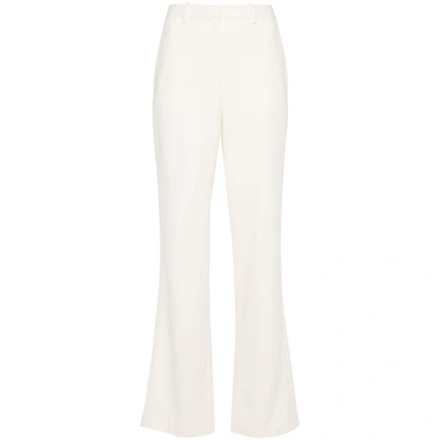 Shop Theory Pants In Neutrals