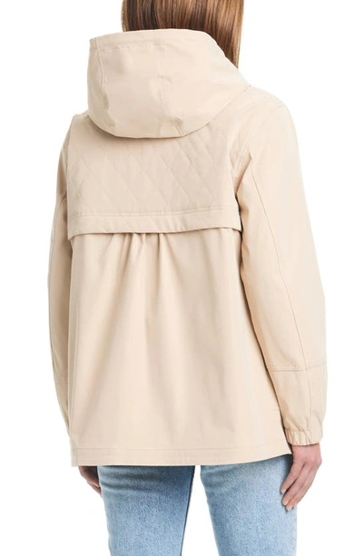 Shop Kate Spade Water Resistant Hooded Raincoat In Feather