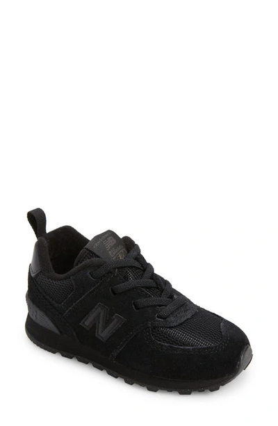 Shop New Balance Kids' 574 Sneaker In Black/ Black