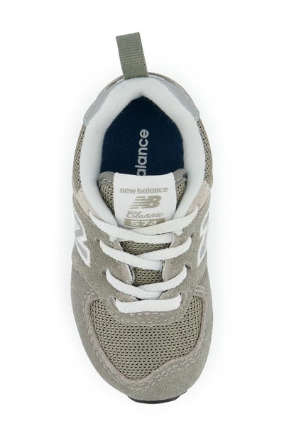 Shop New Balance Kids' 574 Sneaker In Grey/ White